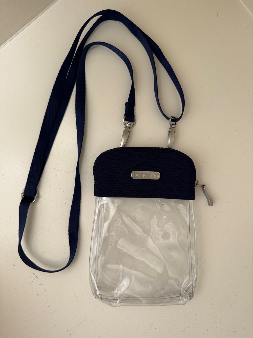 Baggallini clear and navy crossbody see thru bag.